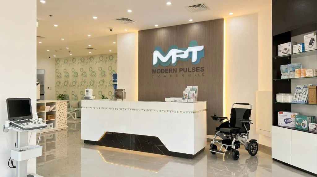 Modern Pulses Trading LLC showroom with reception desk, medical equipment displays and MPT branding